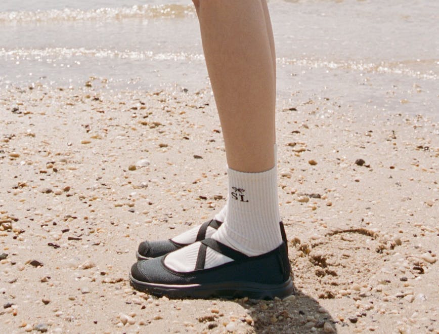 clothing footwear shoe sneaker sandal person walking